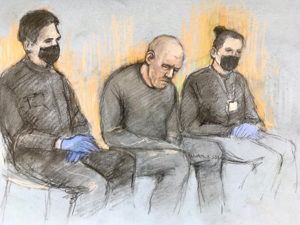 Court artist sketch by Elizabeth Cook of serving police constable Wayne Couzens (centre), appearing in the dock at Westminster Magistrates' Court, in London where he is charged with murder and kidnapping of Sarah Everard. Picture date: Saturday March 13, 2021.