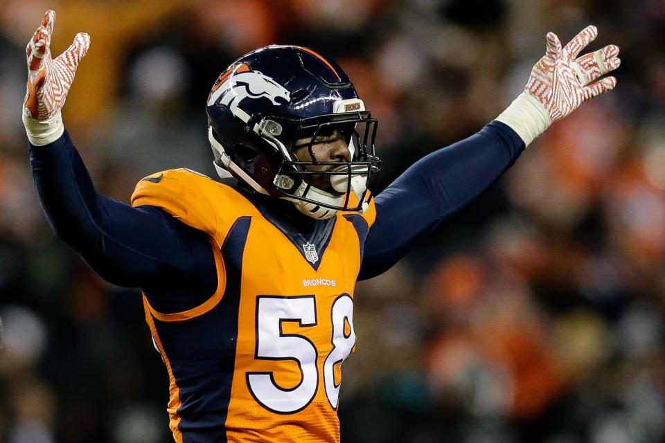 Denver Broncos outside linebacker Von Miller (58) celebrates after a play in the fourth quarter against the Oakland Raiders at Sports Authority Field at Mile High.