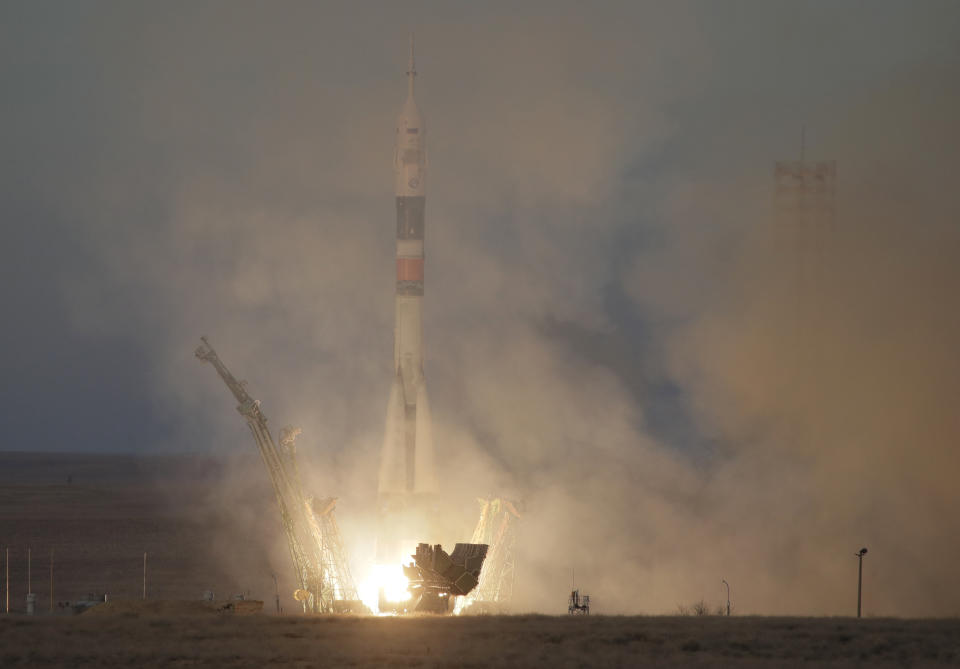 The Soyuz-FG rocket booster with Soyuz MS-11 space ship carrying a new crew to the International Space Station, ISS, blasts off at the Russian leased Baikonur cosmodrome, Kazakhstan, Monday, Dec. 3, 2018. The Russian rocket carries U.S. astronaut Anne McClain, Russian cosmonaut Oleg Kononenko‎ and CSA astronaut David Saint Jacques. (AP Photo/Dmitri Lovetsky)