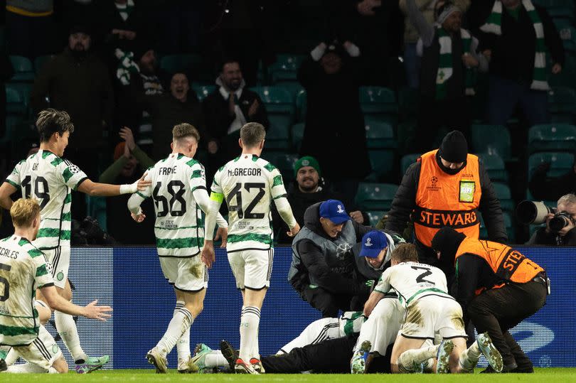 Celtic players celebrate after Gustaf Lagerbielke scores to make it 2-1 to Celtic during a UEFA Champions League group stage match between Celtic and Feyenoord