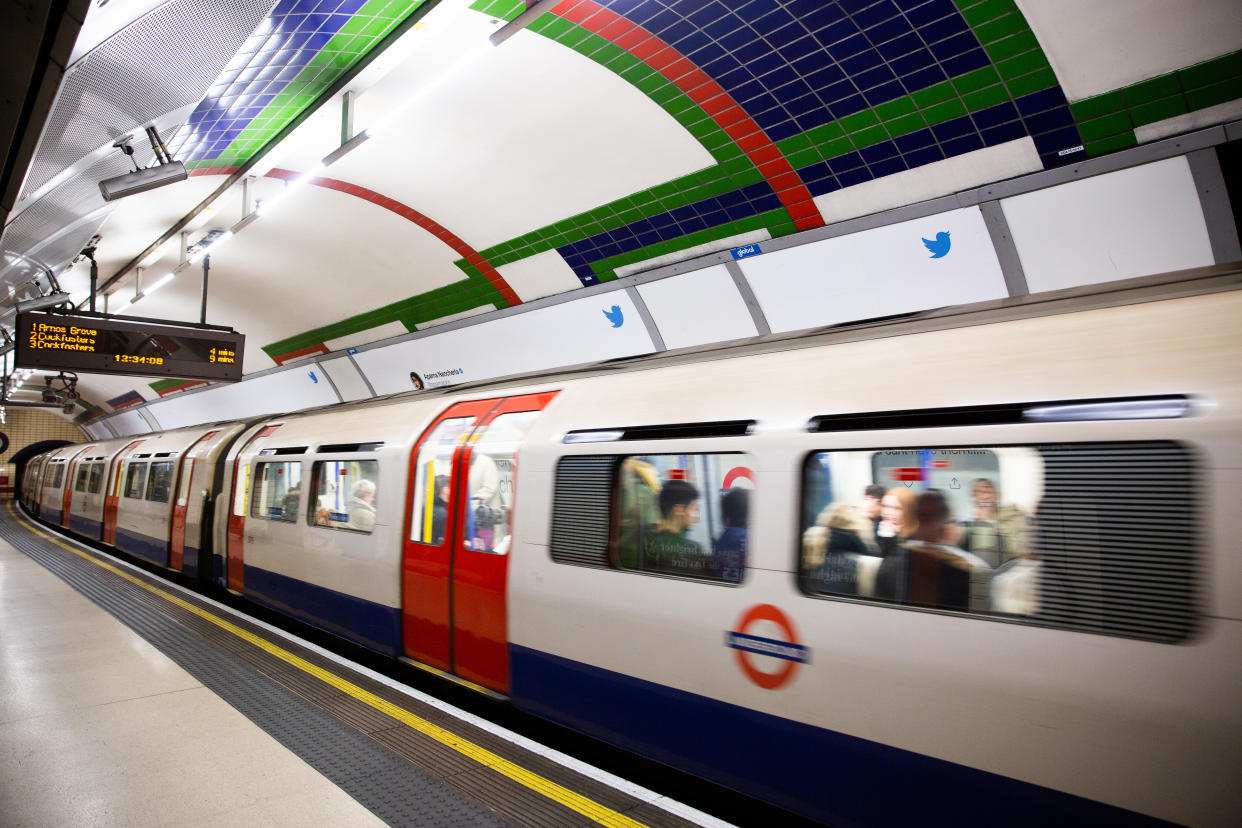 LONDON, UK - FEBRUARY 17, 2020: Train arrives at Piccadilly Circus underground station.