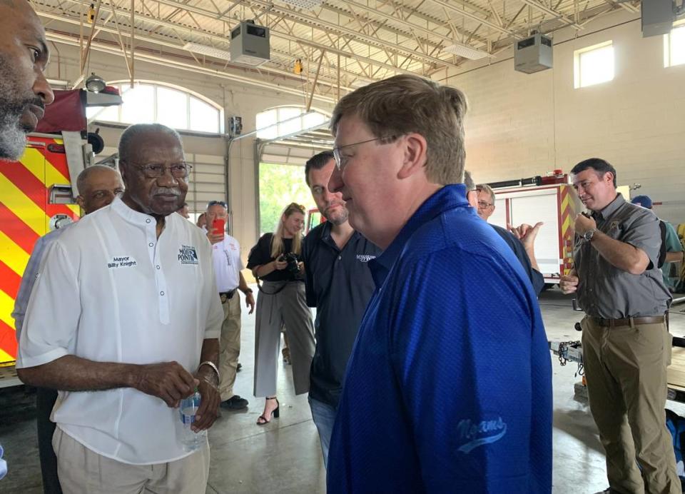 Gov. Tate Reeves, center, meets with Moss Point Mayor Billy Knight and other officials Thursday, June 22, on a visit to see the damage from Monday’s tornado.