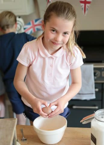 <p>Prince and Princess of Wales Instagram</p> Princess Charlotte cooking.