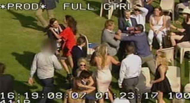 Chaos erupts after the pair fall into crowds as they punch on. Photo: 7News