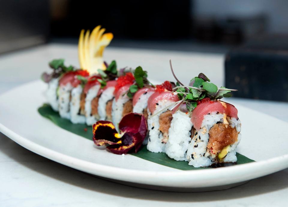 Chef Gary Mawu serves a selection of sushi rolls at Mizu at the Tideline Palm Beach Ocean Resort and Spa.