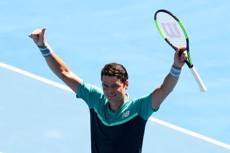 Tennis - Australian Open - Fourth Round - Melbourne Park, Melbourne, Australia, January 21, 2019. Canada’s Milos Raonic celebrates winning his match against Germany's Alexander Zverev. REUTERS/Lucy Nicholson