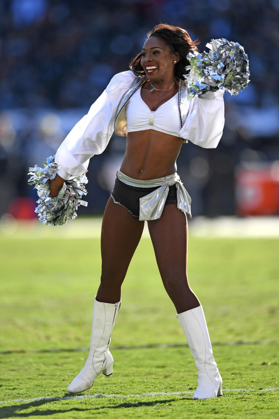 <p>An Oakland Raiders Raiderette performs during their NFL game against the New York Giants at Oakland-Alameda County Coliseum on December 3, 2017 in Oakland, California. (Photo by Thearon W. Henderson/Getty Images) </p>