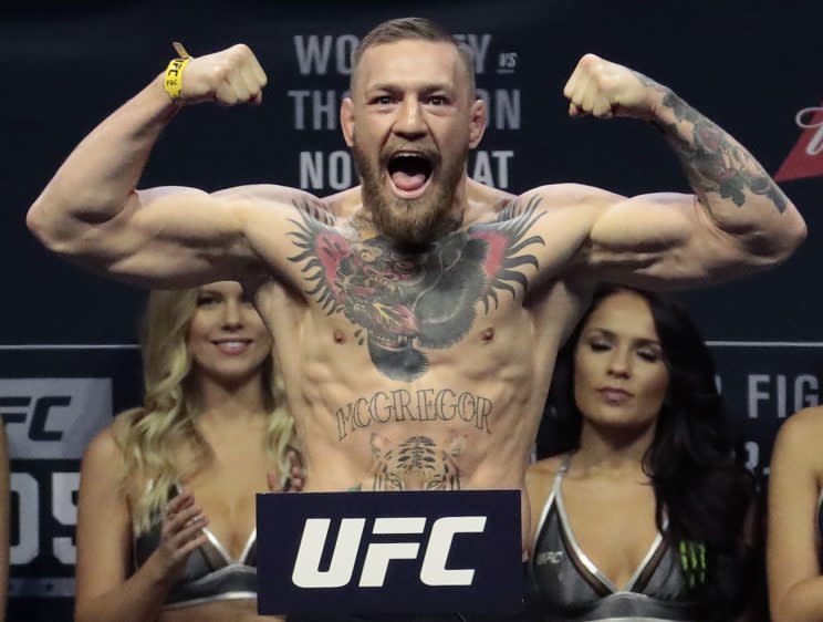 Conor McGregor is an elite MMA fighter, but how would he stand against an all-time great boxer in Floyd Mayweather? (AP)