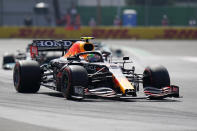 Red Bull driver Sergio Perez, of Mexico, drives his car during the third practice run of the Formula One Mexico Grand Prix auto race at the Hermanos Rodriguez racetrack in Mexico City, Saturday, Nov. 6, 2021. (AP Photo/Eduardo Verdugo)