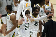 Baylor guard Matthew Mayer (24) celebrates during the first half of a men's Final Four NCAA college basketball tournament semifinal game against Houston, Saturday, April 3, 2021, at Lucas Oil Stadium in Indianapolis. (AP Photo/Darron Cummings)