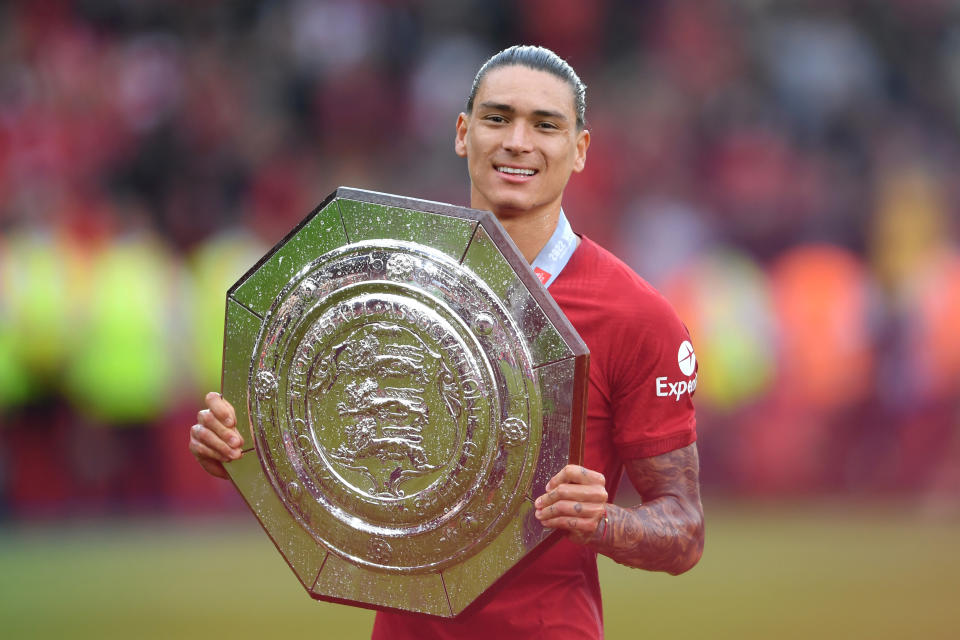 Darwin Nunez (pictured) celebrates with the FA Community Shield trophy.