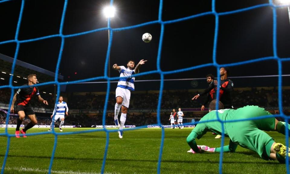 Charlie Austin leaps to opening the scoring on a dramatic night at Loftus Road.