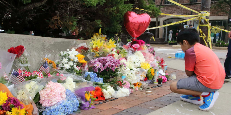 A makeshift shrine honors the victims of the deadly July 4th shooting in Highland Park, Illinois. (Alexandra Buxbaum / Sipa / AP)