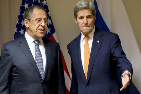 U.S. Secretary of State John Kerry gestures as he meets with Russian Foreign Minister Sergey Lavrov during their meeting on Syria, in Zurich, Switzerland January, 20, 2016. REUTERS/Jacquelyn Martin/Pool