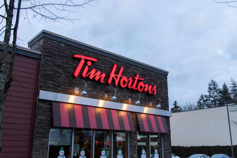 Vancouver, CANADA - Jan 1 2023 : Store sign of Tim Hortons. Tim Hortons Inc. is a Toronto based Canadian coffeehouse and restaurant chain. It is Canada&#39;s largest quick-service restaurant chain