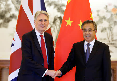 Britain's Chancellor of the Exchequer Philip Hammond meets Chinese Vice Premier Hu Chunhua at Diaoyutai State Guesthouse in Beijing, China, April 25, 2019. REUTERS/Jason Lee/Pool