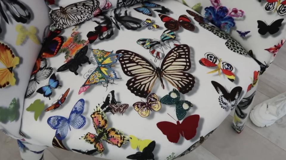 Catherine's favorite armchairs have Christian Lacroix butterfly prints.