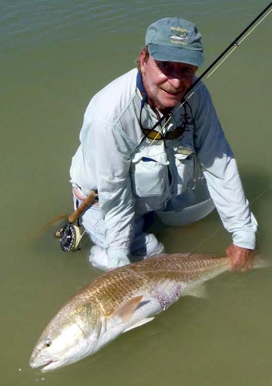 Norm Zeigler with a redfish he caught fly fishing on Sanibel. Zeigler passed away on April 15.