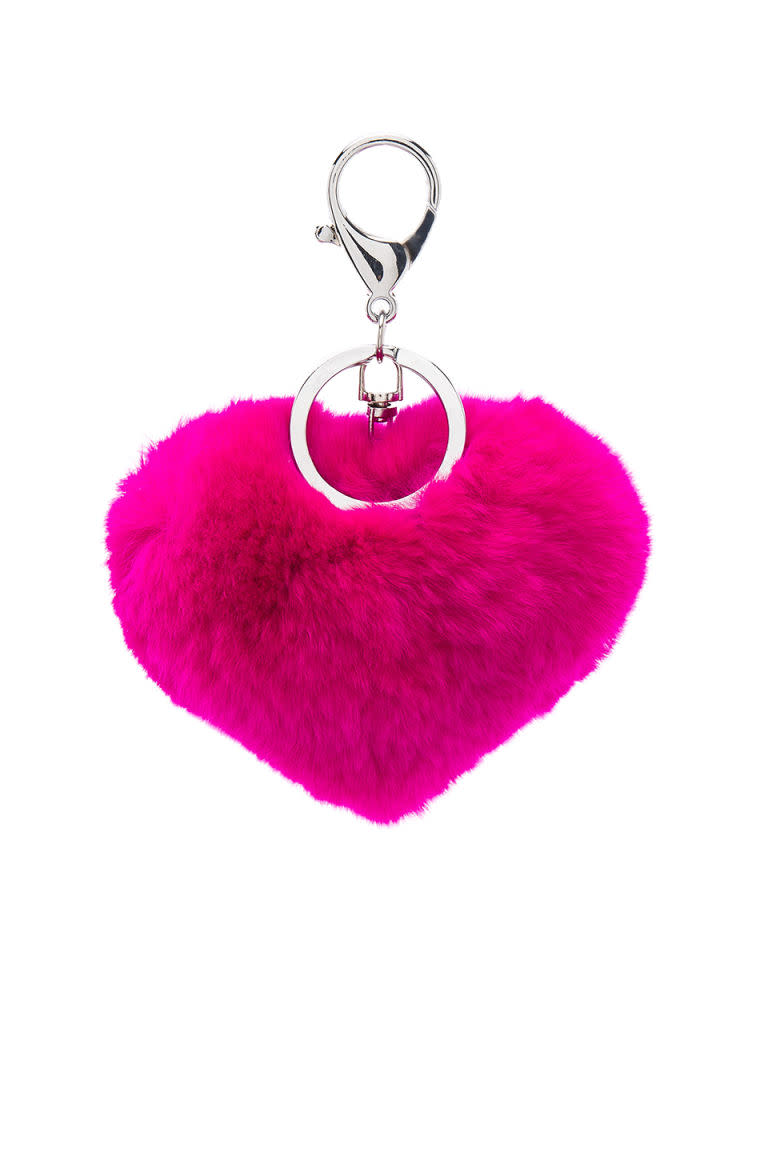 <p><a rel="nofollow noopener" href="http://www.revolveclothing.com/jocelyn-rex-rabbit-heart-keychain-in-fuchsia/dp/JOCE-WA3/?d=Womens" target="_blank" data-ylk="slk:Fuchsia Rex Rabbit Heart-Shaped Keychain;elm:context_link;itc:0;sec:content-canvas" class="link "><i>Fuchsia Rex Rabbit Heart-Shaped Keychain</i></a><i>, JOCELYN (Available at Revolve), $65</i></p>