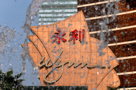 FILE PHOTO: A company logo is displayed in front of a fountain at Wynn Macau resort in Macau, China February 8, 2018. REUTERS/Bobby Yip/File Photo