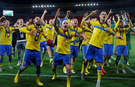 Football - Portugal v Sweden - UEFA European Under 21 Championship - Czech Republic 2015 - Final - Eden Arena, Prague, Czech Republic - 30/6/15 Sweden's John Guidetti (C) celebrates their win after the game with Alexander Milosevic (R) and Abdul Khalili Action Images via Reuters / Lee Smith Livepic