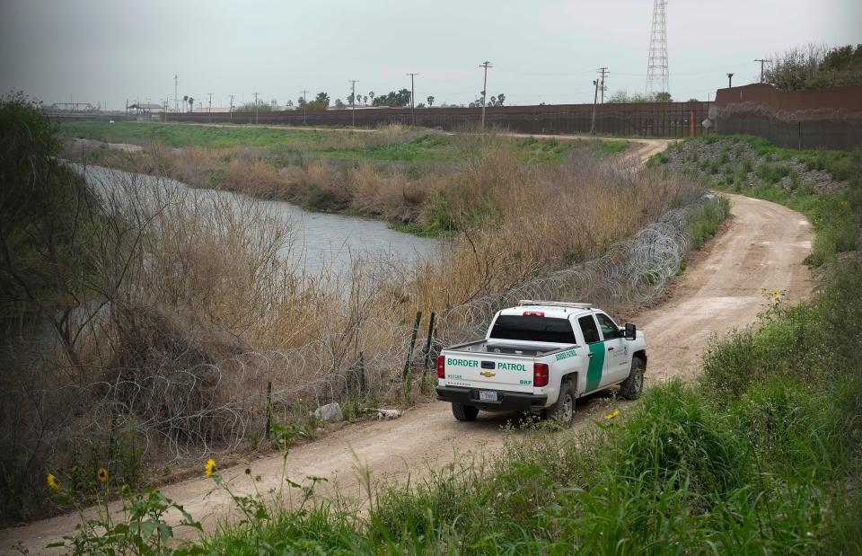 A Border Patrol officer patrols the banks of the Rio Grande in Brownsville Wednesday February 28, 2024.