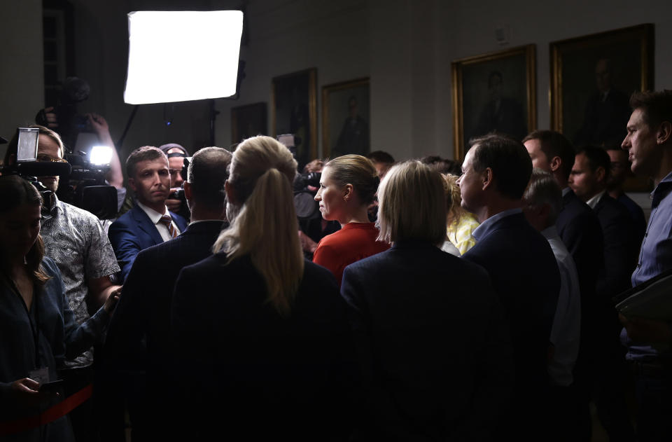 Mette Frederiksen of The Danish Social Democrats, centre, address the media backed by leaders of left-wing parties after finalizing the government negotiations shortly after midnight at Christiansborg Castle in Copenhagen, Denmark, early Wednesday June 26, 2019. Frederiksen announced that The Danish Social Democrats will form a minority government backed by three other left-wing parties. (Mads Claus Rasmussen/Ritzau Scanpix via AP)