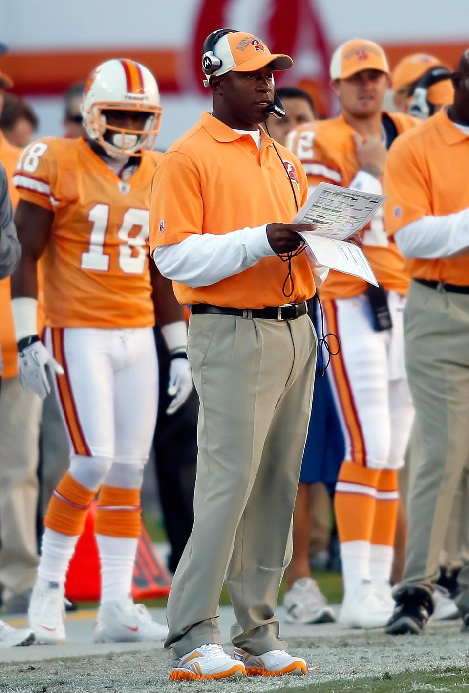 TAMPA, FL - DECEMBER 05:  Head coach Raheem Morris of the Tampa Bay Buccaneers watches his team against the Atlanta Falcons during the game at Raymond James Stadium on December 5, 2010 in Tampa, Florida.  (Photo by J. Meric/Getty Images)