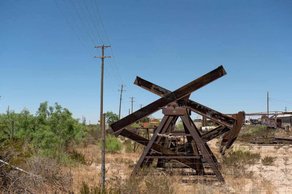 Image: An oil pump well near the Loving County Courthouse. (Sarah M. Vasquez for NBC News)