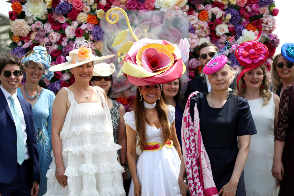 <p>Racegoers including Tracy Rose (centre) pose for the picture during day one of Royal Ascot at Ascot Racecourse. Picture date: Tuesday June 15, 2021.</p>
