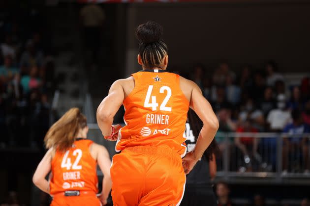 Candace Parker of Team Wilson runs on to the court wearing the jersey of Brittney Griner of the Phoenix Mercury during the 2022 AT&T WNBA All-Star Game at Wintrust Arena in Chicago. (Photo: Stephen Gosling via Getty Images)