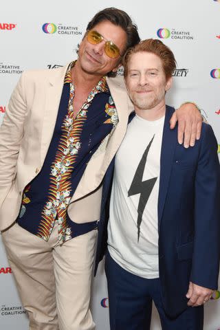 <p>Olivia Wong/Getty </p> John Stamos and Seth Green