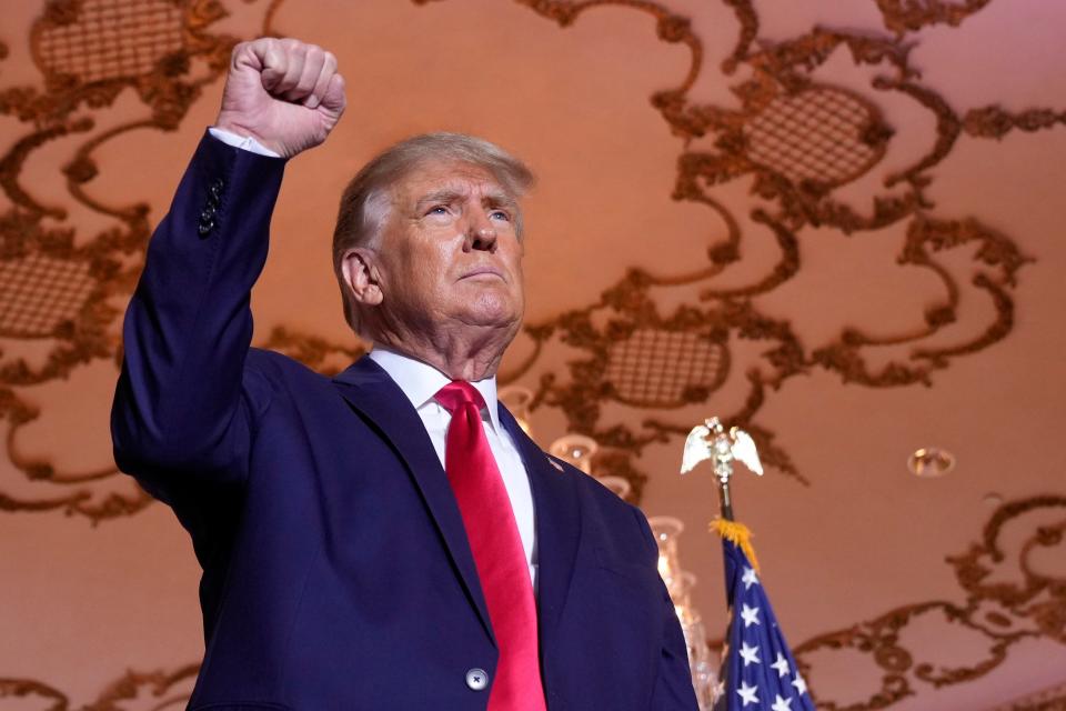 Former President Donald Trump stands on stage after announcing a third run for president as he speaks Tuesday, Nov. 15, 2022, at Mar-a-Lago in Palm Beach, Florida.