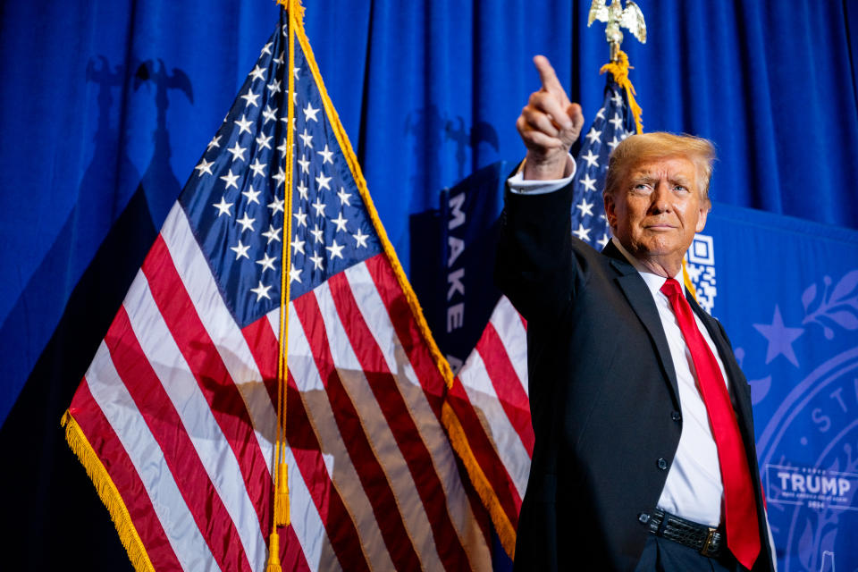 ATKINSON, NEW HAMPSHIRE - JANUARY 16: Republican presidential candidate, former U.S. President Donald Trump points to supporters at the conclusion of a campaign rally at the Atkinson Country Club on January 16, 2024 in Atkinson, New Hampshire. Trump won this week's Iowa caucus, solidifying him as the lead Republican nominee in the first balloting of 2024. The former U.S. President heads to Atkinson, New Hampshire today as he continues campaigning during the primary election. (Photo by Brandon Bell/Getty Images)