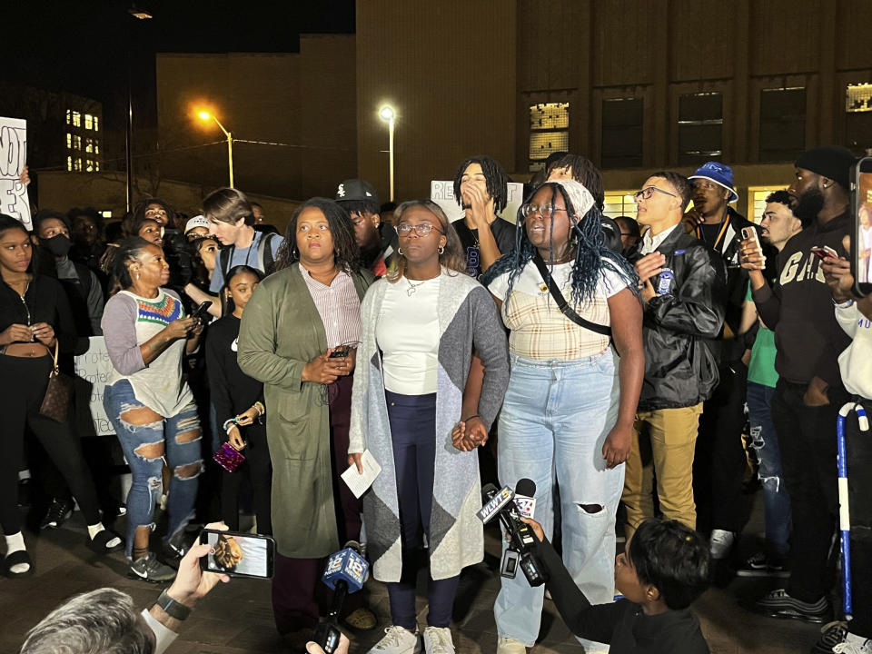 Kylah Spring, center, speaks at a march against racism on University of Kentucky's campus on Monday, Nov. 7, 2022 in Lexington, Ky. University of Kentucky officials said they are still reviewing an incident in which Sophia Rosing, a white student is accused of physically assaulting a Black student worker while repeatedly using racial slurs. (Monica Kast/Lexington Herald-Leader via AP)