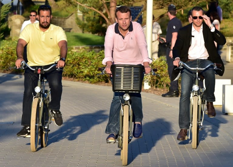 Alexandre Benalla, left, has often been seen just steps behind Emmanuel Macron, both during his election campaign as well as after he became president