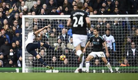 Tottenham Hotspur v West Bromwich Albion - Premier League - White Hart Lane - 14/1/17 Tottenham's Harry Kane scores their third goal Reuters / Dylan Martinez Livepic