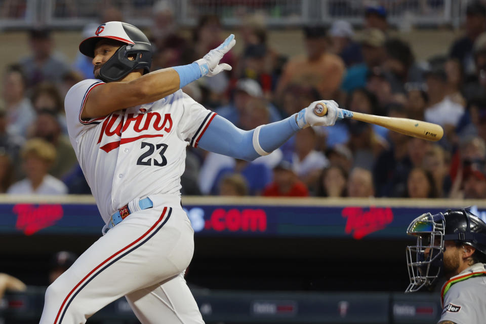 Minnesota Twins' Royce Lewis hits an RBI single against the Detroit Tigers in the sixth inning of a baseball game Tuesday, Aug. 15, 2023, in Minneapolis. The Twins won 5-3. (AP Photo/Bruce Kluckhohn)