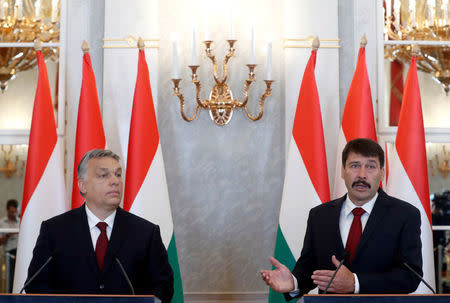 Hungarian President Janos Ader and Hungarian Prime Minister Viktor Orban give a statement to the media after their talks at the Presidential Palace in Budapest, Hungary, May 7, 2018. REUTERS/Bernadett Szabo