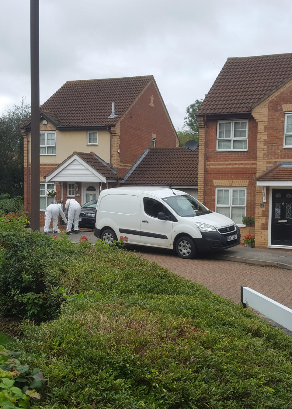 Police at a housing estate in Emerson Valley, Milton Keynes, where two teenage boys were stabbed to death last night following a "shocking" altercation. One of the two 17-year-olds, who have not yet been identified, died at the scene while the other was rushed to hospital but died in the early hours of Sunday morning.