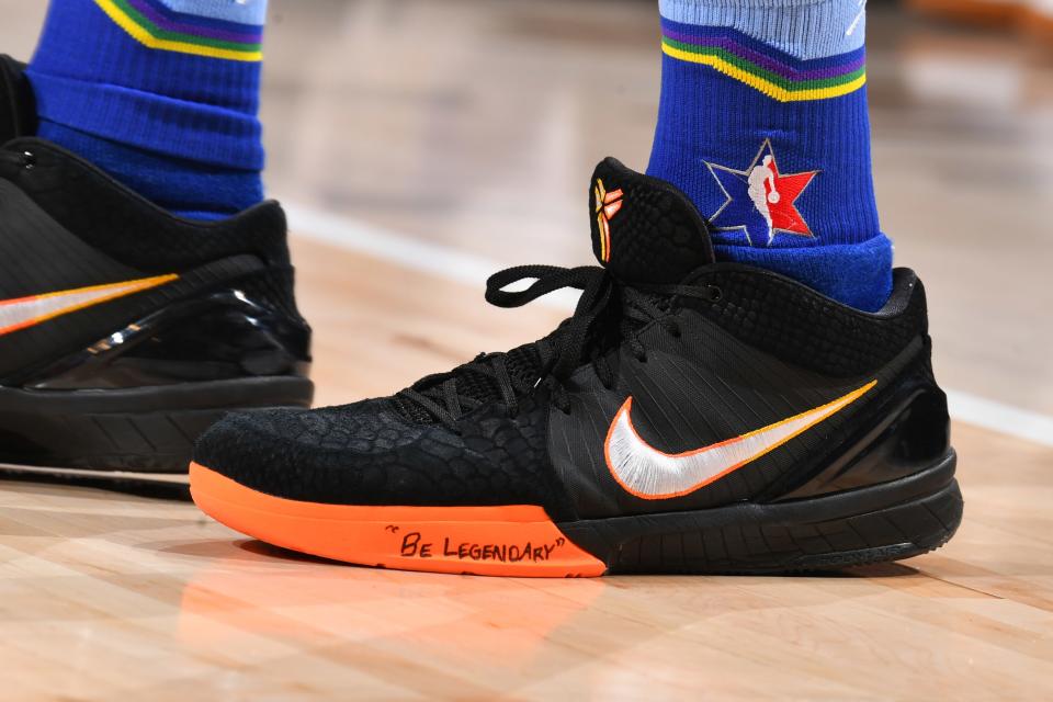 Booker's All-Star sneakers with a little reminder.