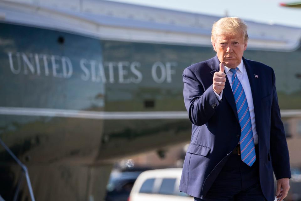 President Donald Trump gives a thumbs-up as he boards Air Force One in Morristown, New Jersey, in June 2020.