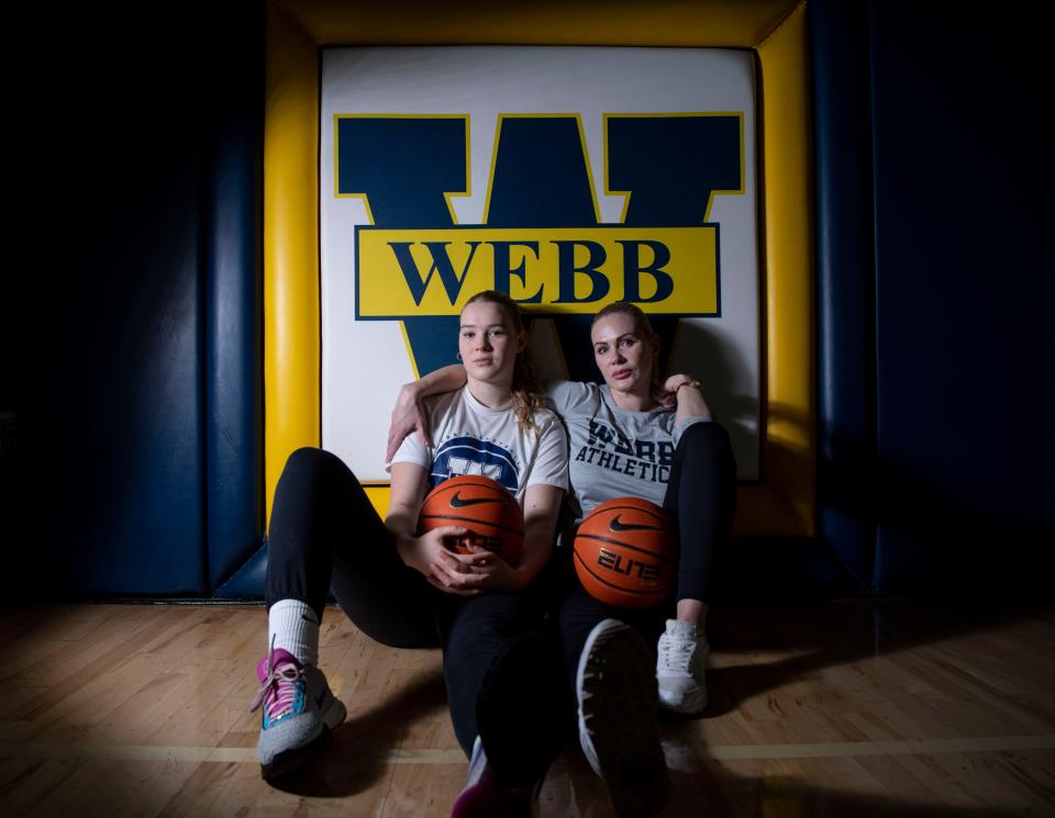 Dasha Biriuk and her mom sit together at Webb School in Bell Buckle, Tenn., Wednesday, Jan. 31, 2024. Their family left Ukraine amid the Russian invasion and Dasha is now a basketball standout at Webb School.