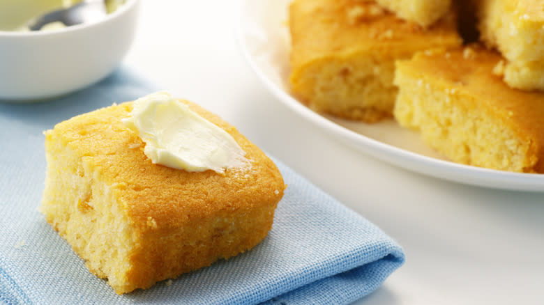 piece of buttered cornbread