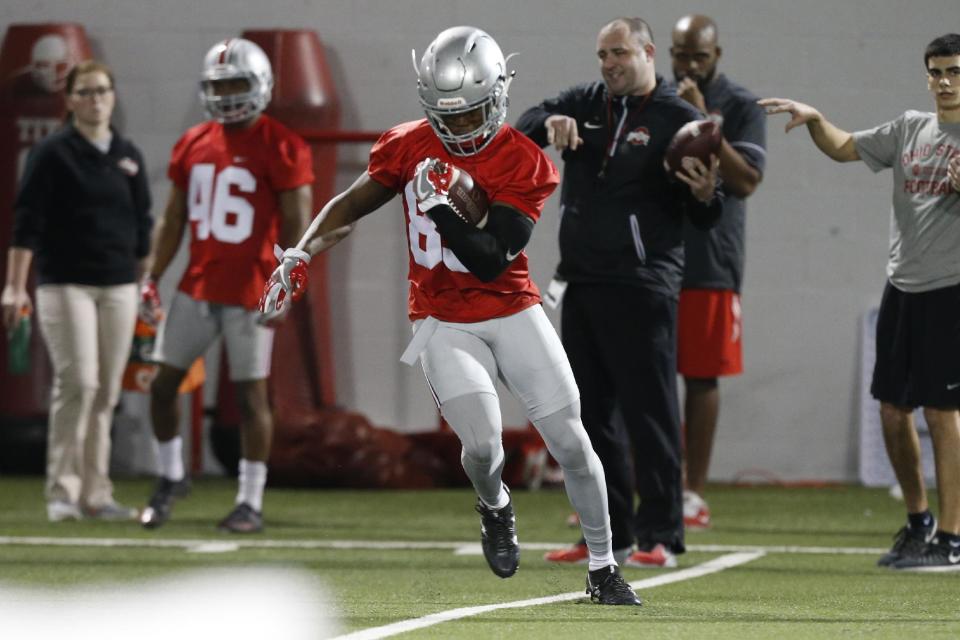 Ohio State wide receiver Terry McLaurin runs the ball after a catch during spring NCAA college football practice Tuesday, March 7, 2017, in Columbus, Ohio. (AP Photo/Jay LaPrete)
