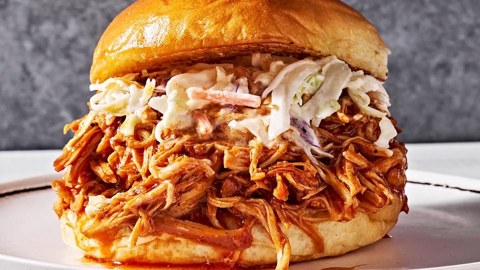 brown sugar bbq chicken in a sandwich with slaw