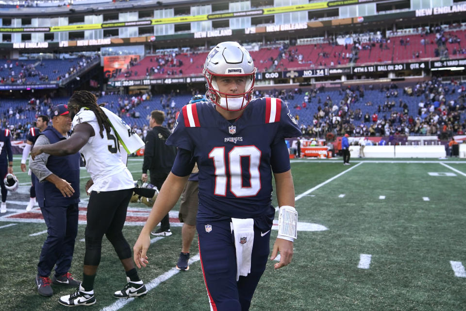 New England Patriots quarterback Mac Jones (10) walks off the field after the team was defeated in a shutout loss to the New Orleans Saints in an NFL football game, Sunday, Oct. 8, 2023, in Foxborough, Mass. (AP Photo/Charles Krupa)