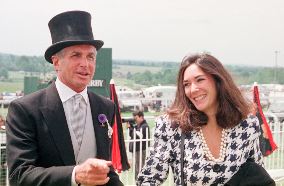 Actor George Hamilton with Ghislaine Maxwell, daughter of Robert Maxwell, arriving at Epsom.