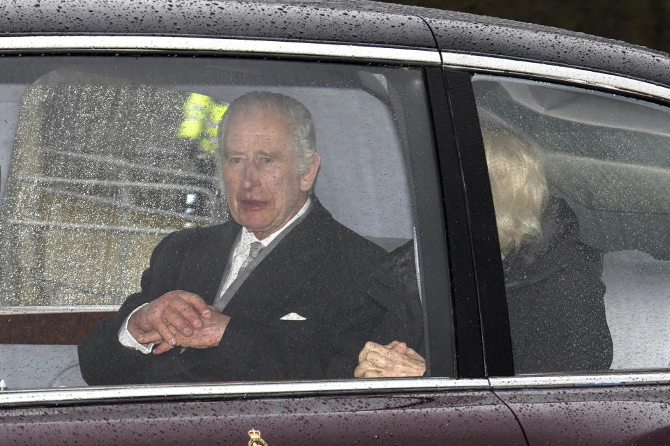 Britain's King Charles III and Queen Camilla arrive back at Clarence House in London, Tuesday Feb. 13, 2024 after spending a week at Sandringham in Norfolk, following the announcement of King Charles III's cancer diagnosis. (Jordan Pettitt/PA via AP)