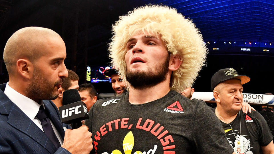 UFC fighter Khabib Nurmagomedov (pictured) talking to the commentator after the fight.